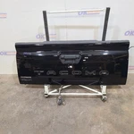 2024 Toyota Tacoma SR5 Decklid Tail Gate Black Manual Used. Price: $1147.50.