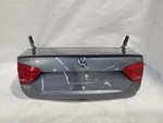 2015 Volkswagen Passat Oem LD7X Platinum Gray Complete Trunk Lid With Hinges Used. Price: $324.00.