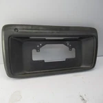 1999-2001 Toyota 4RUNNER Rear License Plate Bezel With Tailgate Handle Used. Price: $75.00.