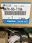 Mazda BN7H-50-710A Grille Black 2001-03 PROTEGE-5 (sedan) W/mps Option Nos New. Price: $100.00.